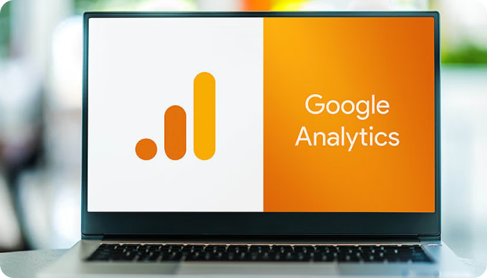 Laptop displaying the Google Analytics logo on the screen